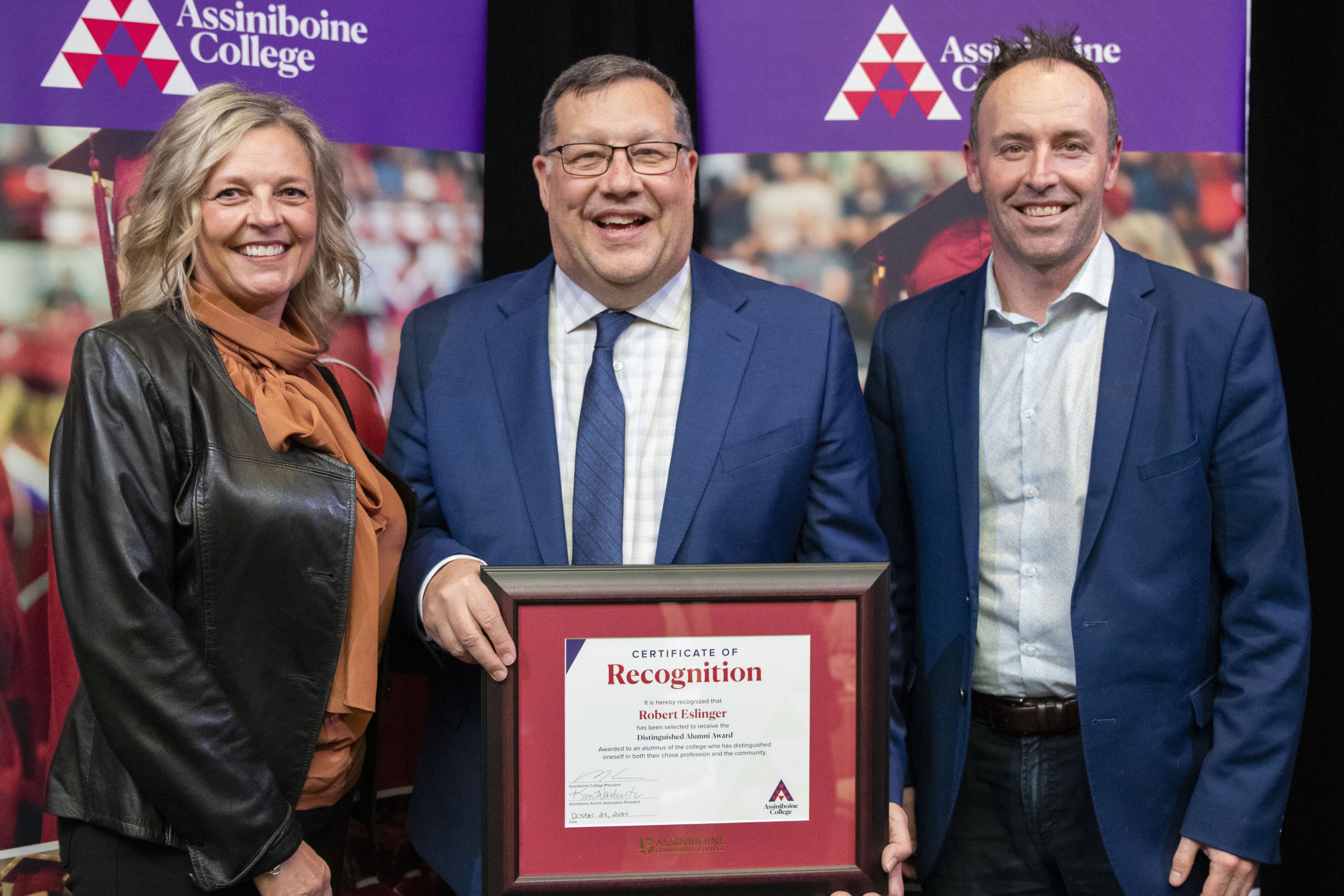 Robert Eslinger with his Distinguished Alumni award certificate.